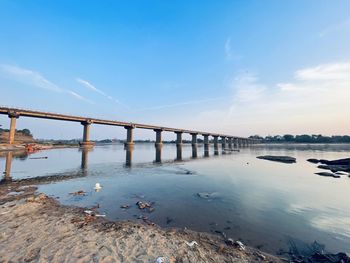 Pier over sea against sky