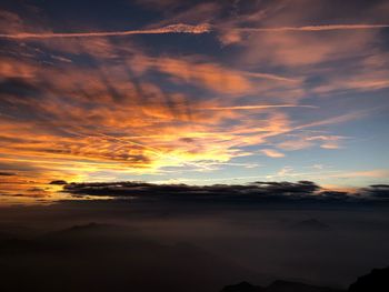 Scenic view of dramatic sky during sunset