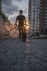 Man riding bicycle on street