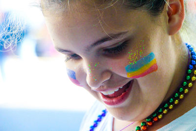 Close-up portrait of smiling girl