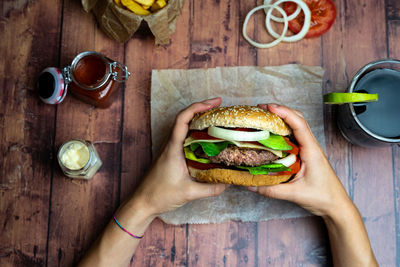 Midsection of man eating food