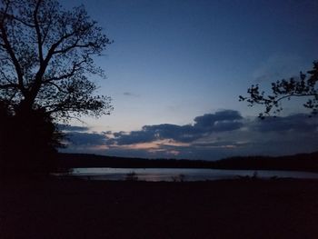 Scenic view of beach against sky during sunset