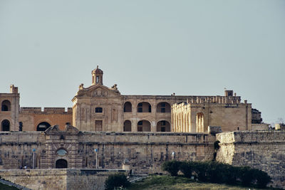 Low angle view of historic building against clear sky