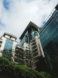 Low angle view of skyscrapers against sky