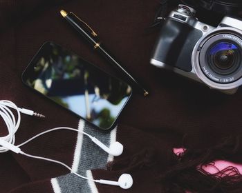 High angle view of personal accessories on table