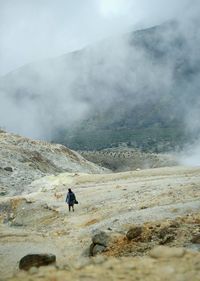 Full length of man on arid landscape