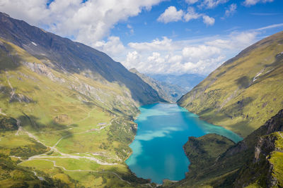 Aerial of dam and alpine water reservoirs, kaprun, austria