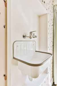 Close-up of faucet in bathroom