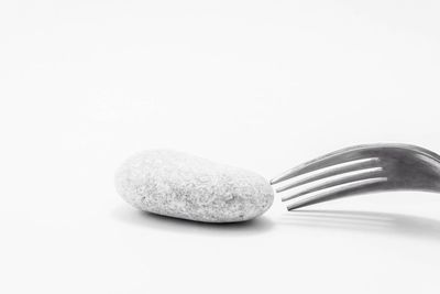 Close-up of food over white background