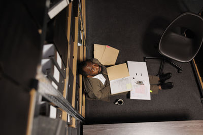 High angle view of paper on table