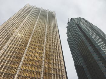 Low angle view of skyscrapers against sky