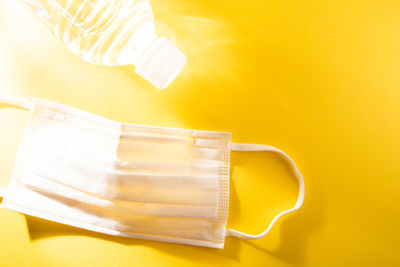 High angle view of drinking glasses on table
