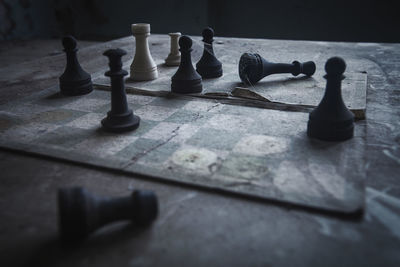 Close-up of chess board in abandoned room