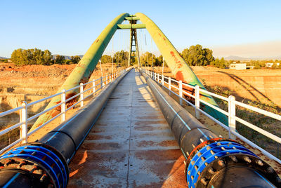 Pedestrian bridge on a bright sunny morning through the strait canal of corinth connecting
