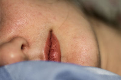 Close-up of woman resting