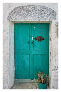 Blue closed door of building