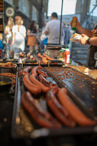 People at market stall in city