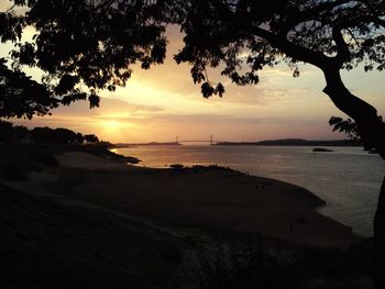 Scenic view of sea at sunset