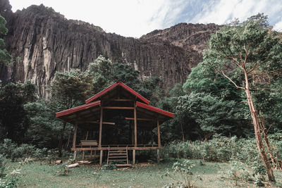 Built structure on land against sky