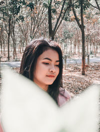 Portrait of young woman in sunlight