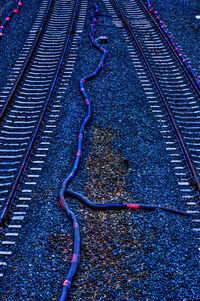 High angle view of railroad tracks on road