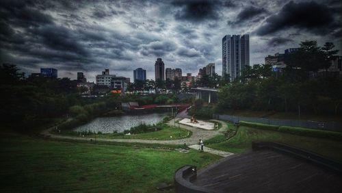 Panoramic view of buildings in city against sky