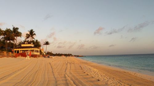 Scenic view of beach against sky during sunset