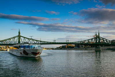 Bridge over river against sky