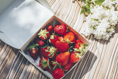 High angle view of strawberries on table