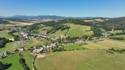 High angle view of townscape against mountain