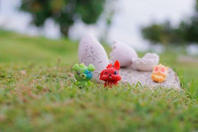 Close-up of stuffed toy on field