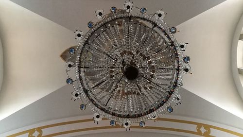 Low angle view of illuminated ceiling