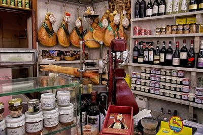 Various bottles on shelf at store