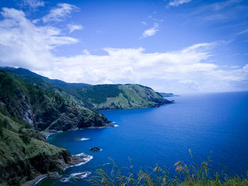 Scenic view of bay against sky