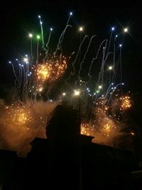 Low angle view of firework display