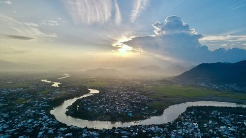 Aerial view of landscape against sky during sunset
