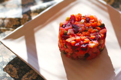 High angle view of chopped strawberries on table