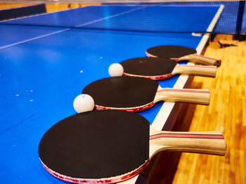 Close-up of sports equipment on table tennis