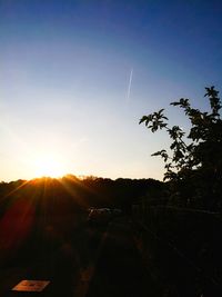 Silhouette landscape against sky during sunset