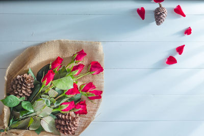 High angle view of red roses on table