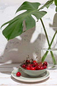 Close-up of strawberries in plate on table