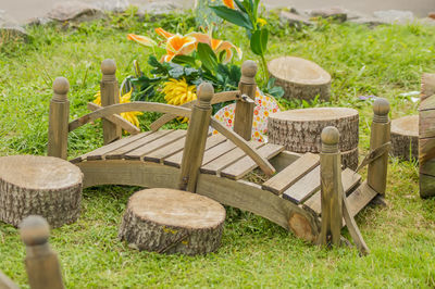 Empty chairs and table in park