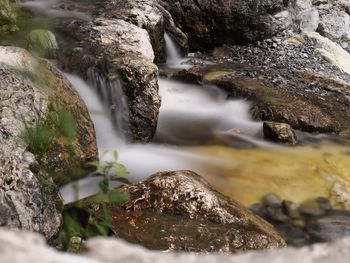 Stream flowing through rocks