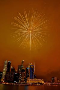 Firework display at night