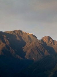 Scenic view of volcanic mountain against sky