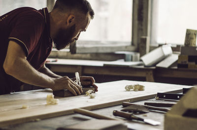 Man working on table