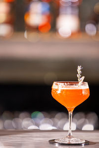 Close-up of wineglass on table