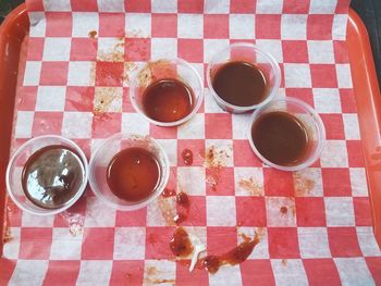 High angle view of coffee cups on table