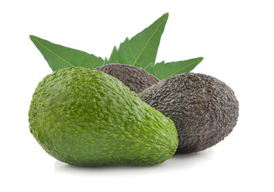 Close-up of fruit against white background