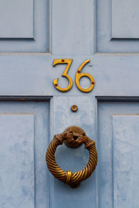 Close-up of closed door knocker